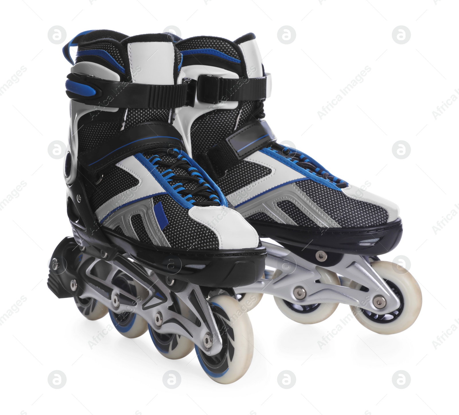 Photo of Pair of inline roller skates on white background. Sports equipment