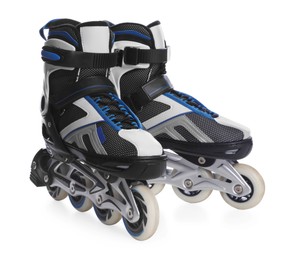 Photo of Pair of inline roller skates on white background. Sports equipment