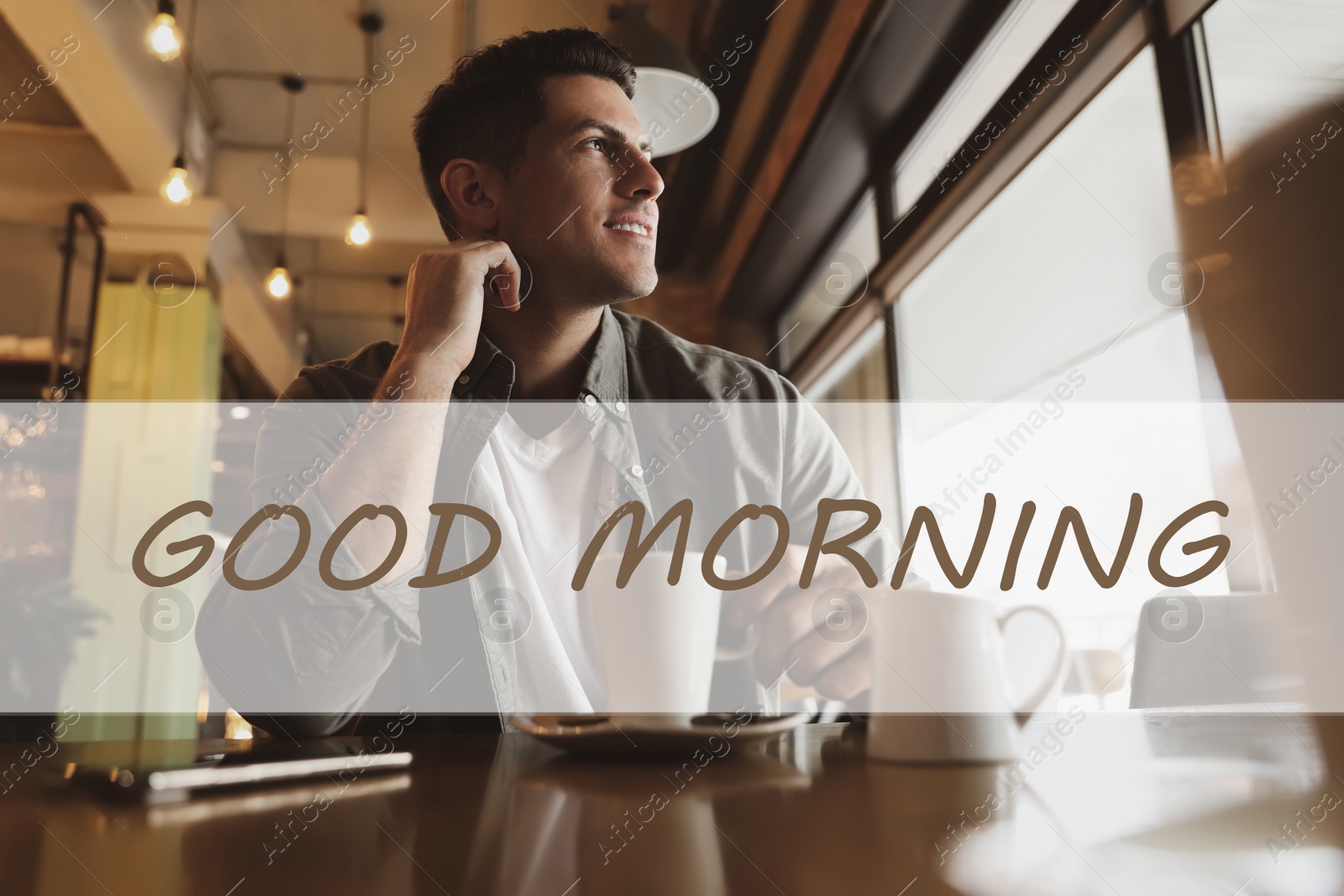 Image of Good Morning! Handsome man with cup of coffee at cafe