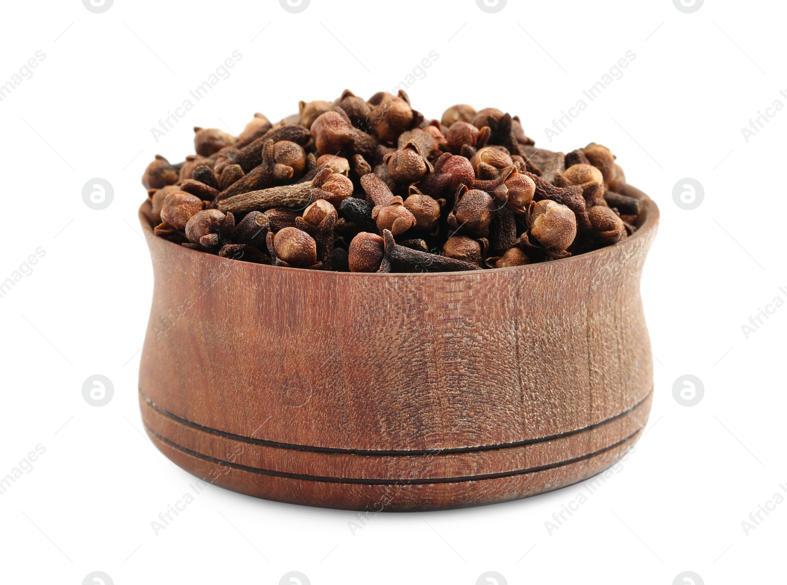 Photo of Aromatic dry cloves in wooden bowl isolated on white