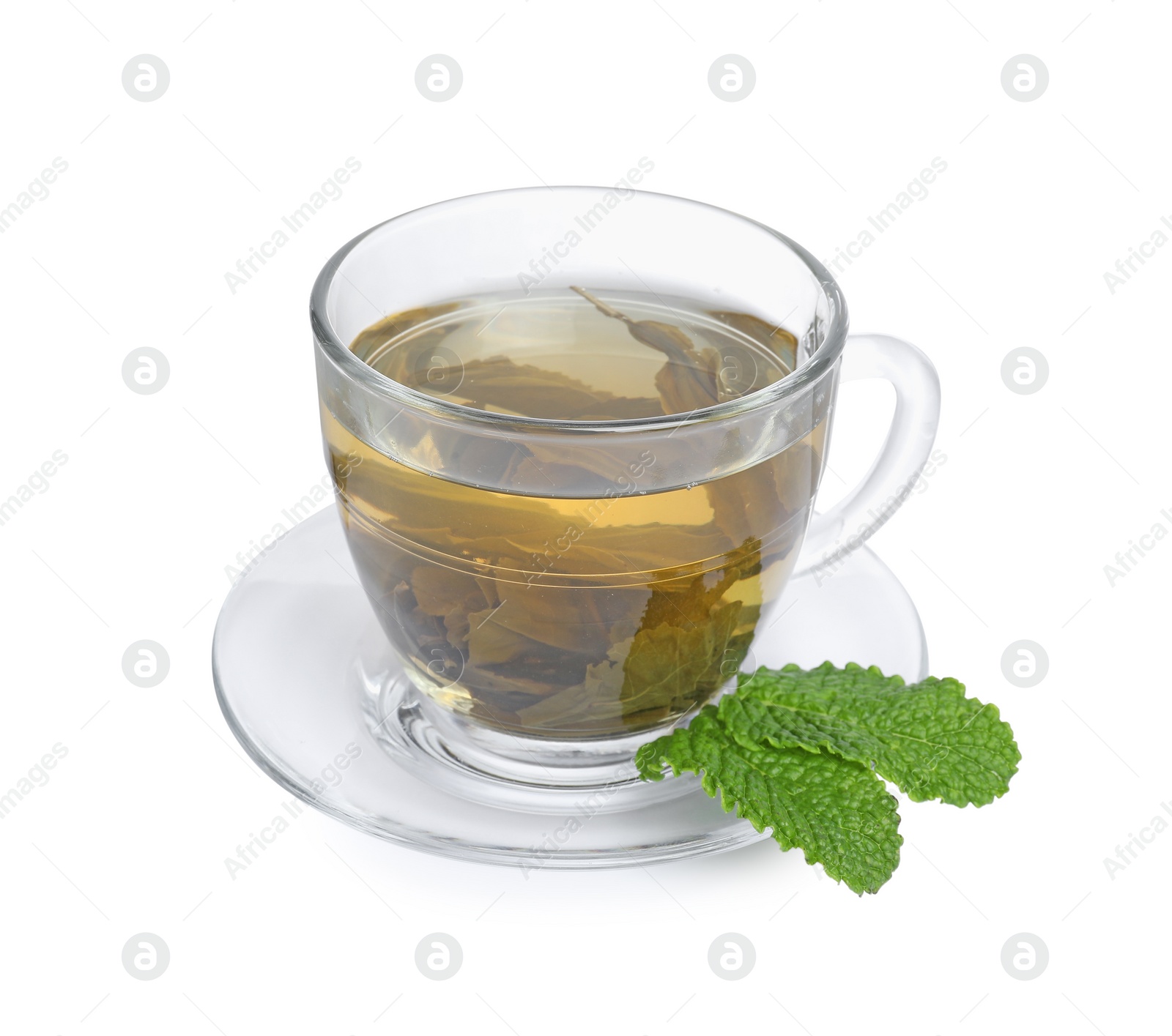 Photo of Fresh green tea in glass cup, mint and saucer isolated on white