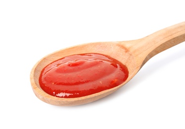 Photo of Spoon of tasty tomato sauce isolated on white