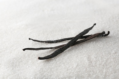 Photo of Vanilla sugar and sticks, closeup