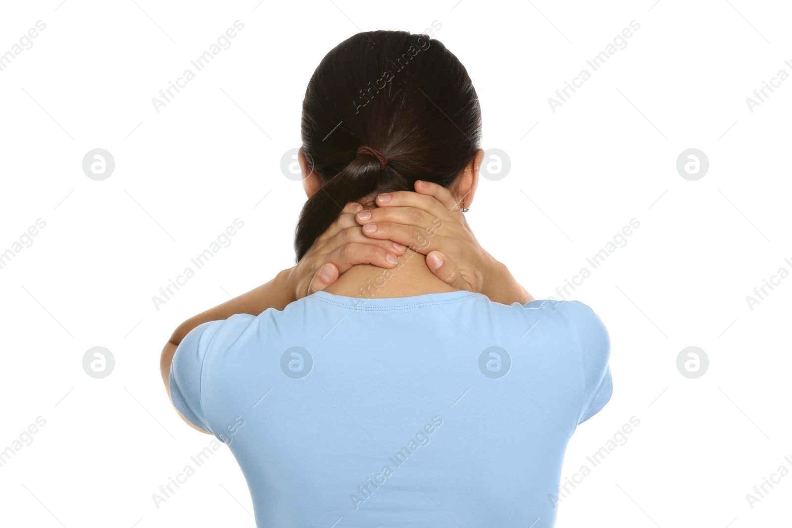 Photo of Young woman suffering from neck pain on white background, back view