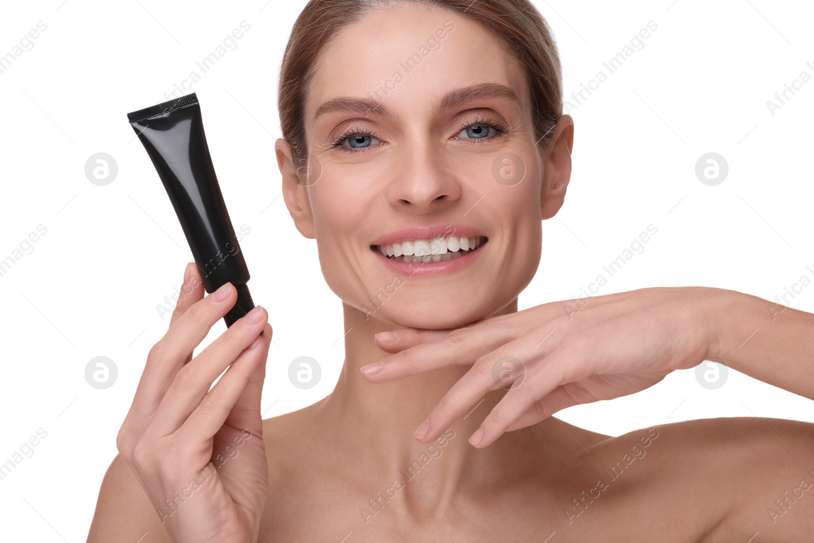 Photo of Woman holding tube with foundation on white background