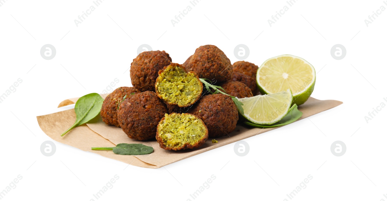 Photo of Delicious falafel balls, basil, arugula and lime isolated on white