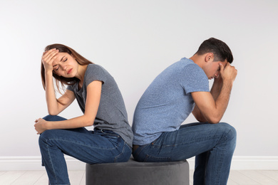 Photo of Couple with relationship problems on light background