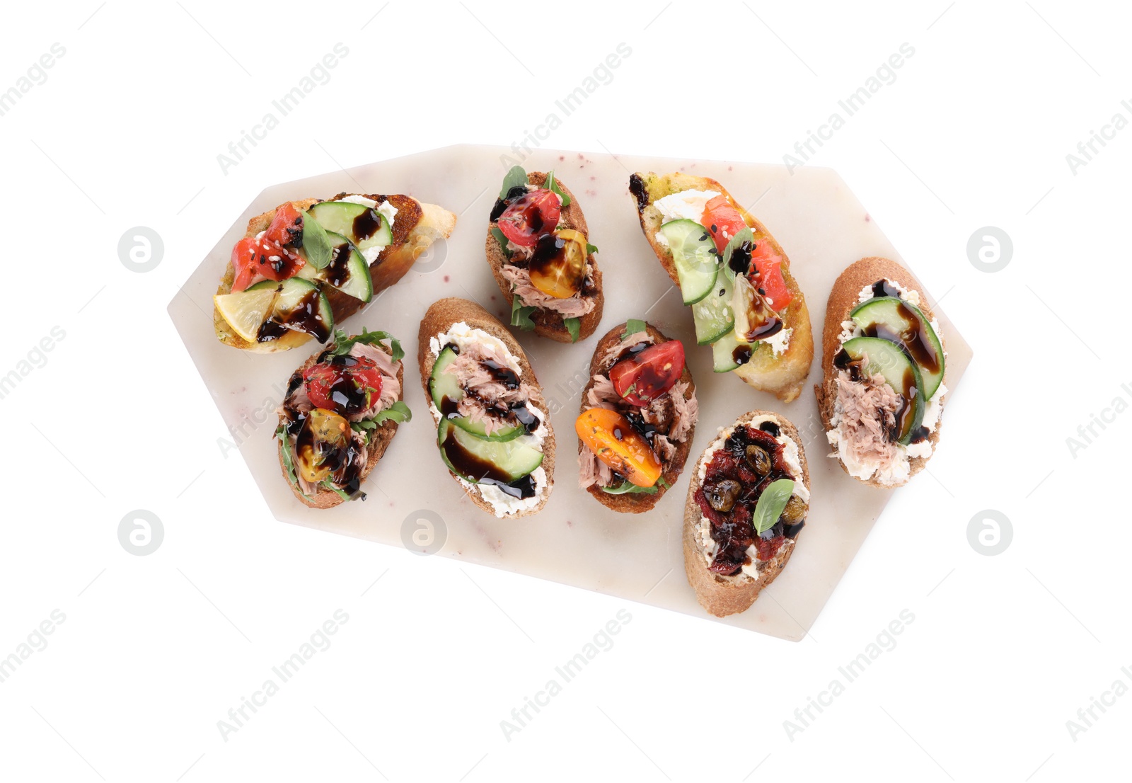Photo of Delicious bruschettas with balsamic vinegar and different toppings isolated on white, top view
