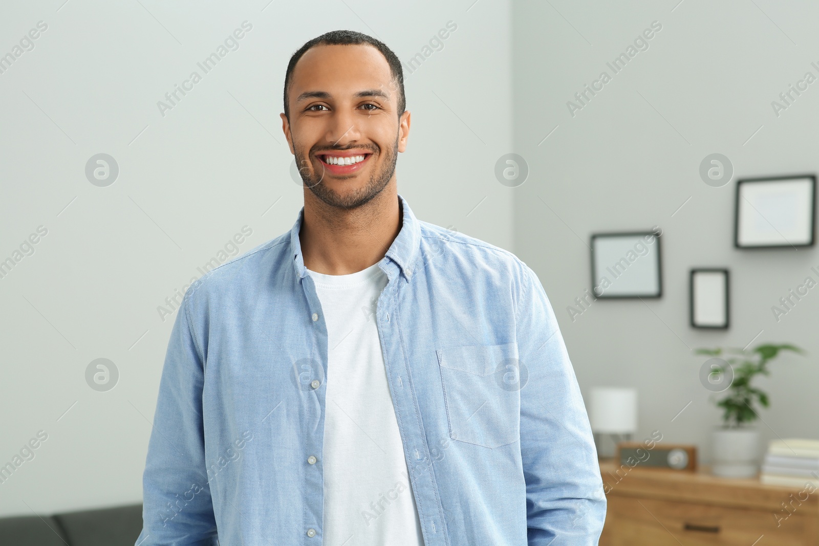 Photo of Portrait of handsome young man at home