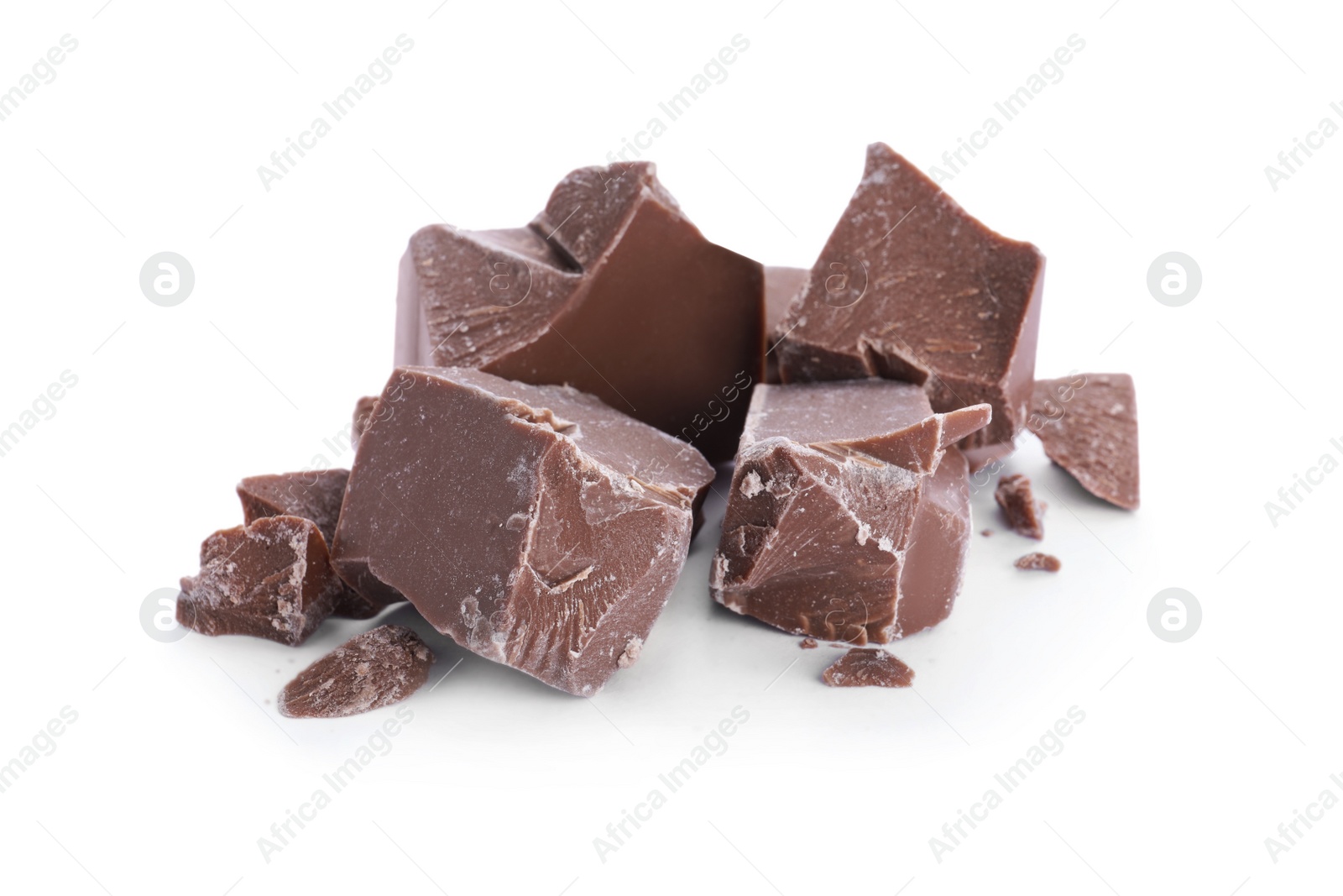 Photo of Pieces of milk chocolate isolated on white