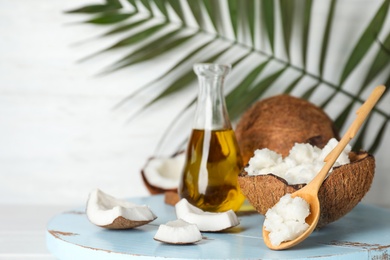 Photo of Composition with coconut oil on table. Healthy cooking