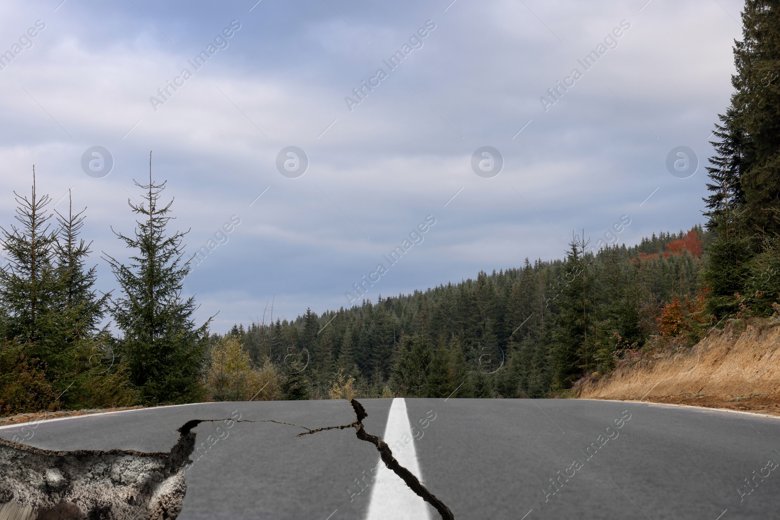 Image of Large cracks on asphalt road after earthquake