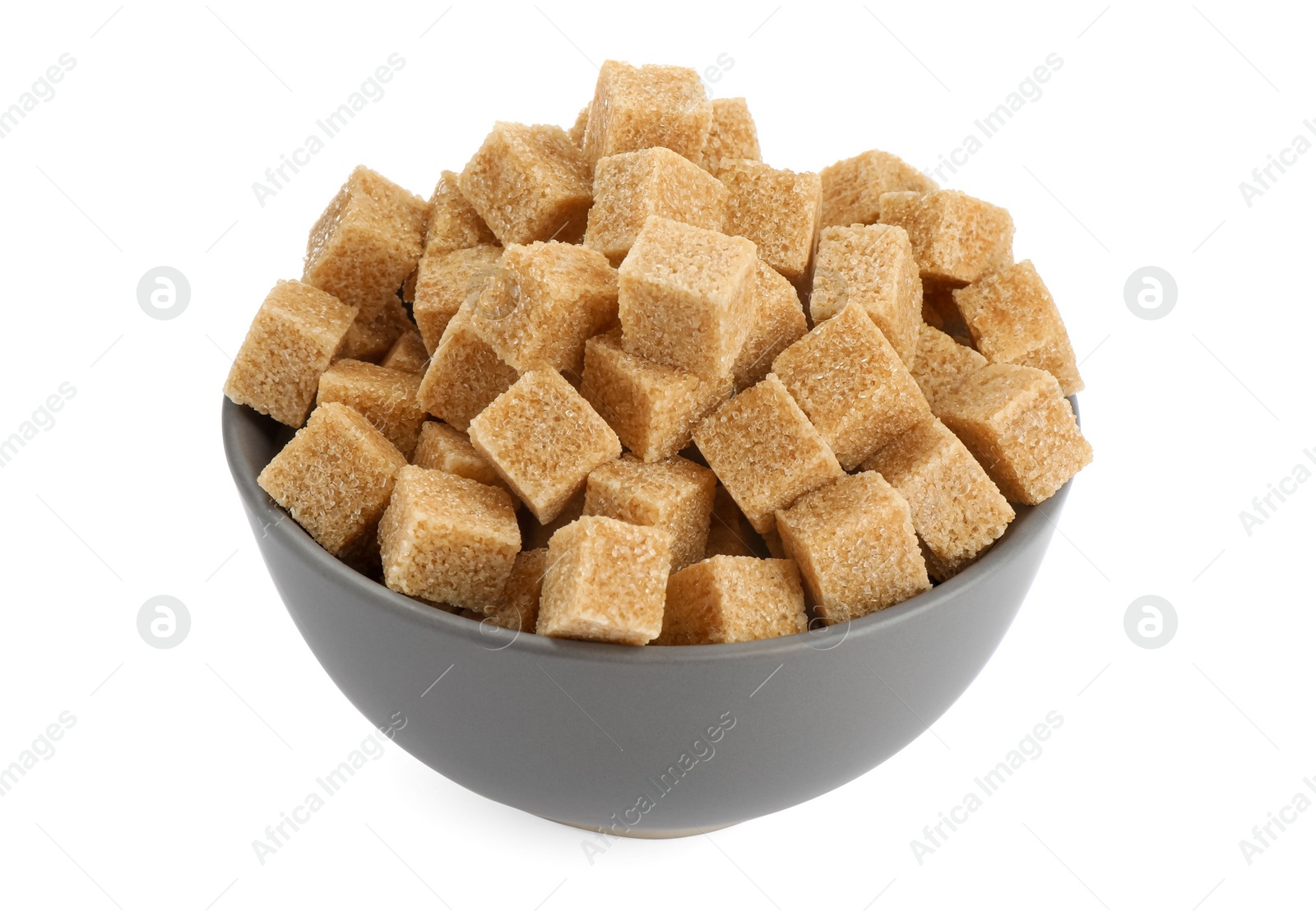 Photo of Bowl with cubes of brown sugar isolated on white