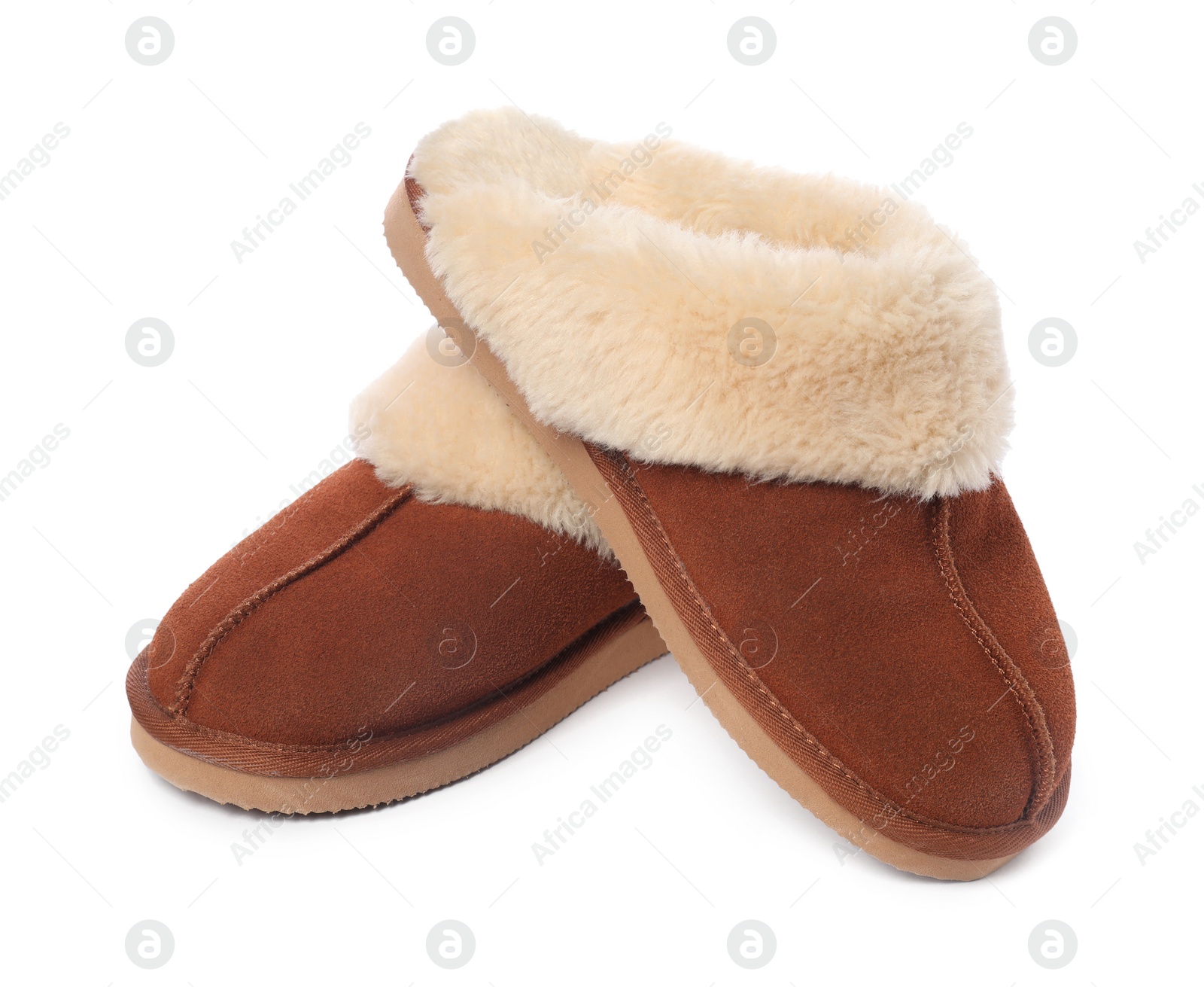 Photo of Pair of soft slippers with fur isolated on white