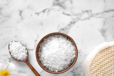 Photo of Flat lay composition with white sea salt on marble background, space for text. Spa treatment