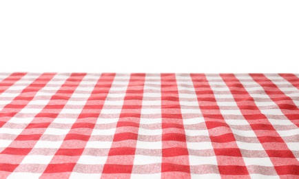 Table with red checkered cloth isolated on white