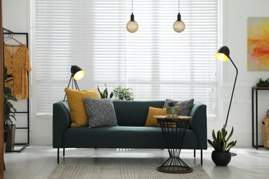 Photo of Modern living room interior with stylish comfortable sofa