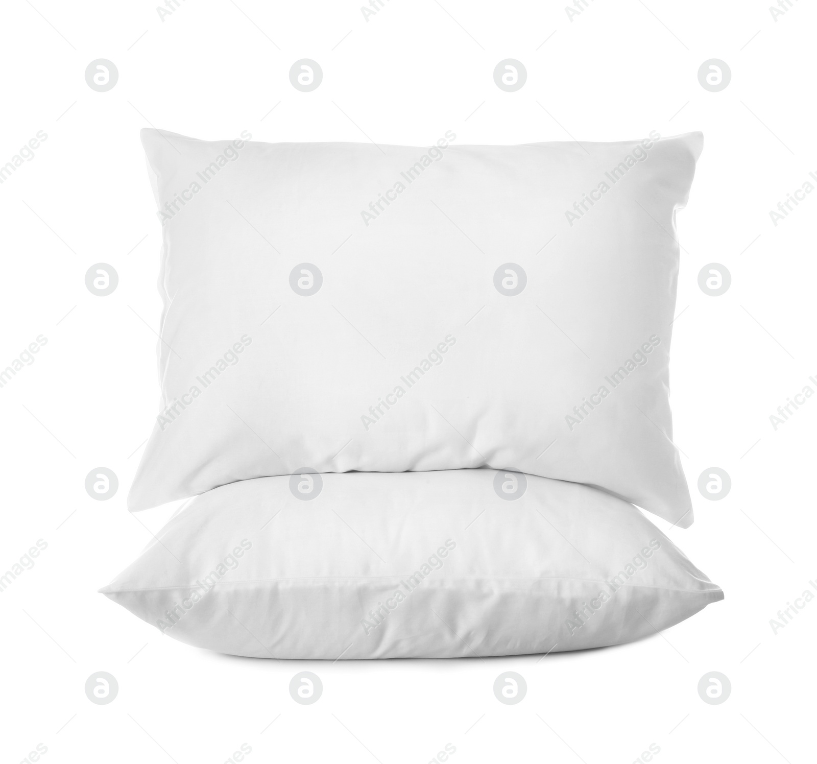 Photo of Clean soft bed pillows on white background