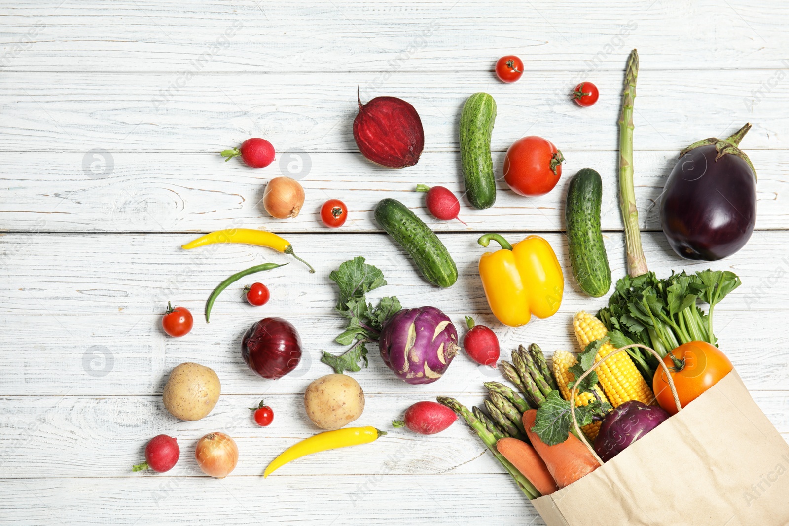 Photo of Flat lay composition with fresh vegetables on wooden background