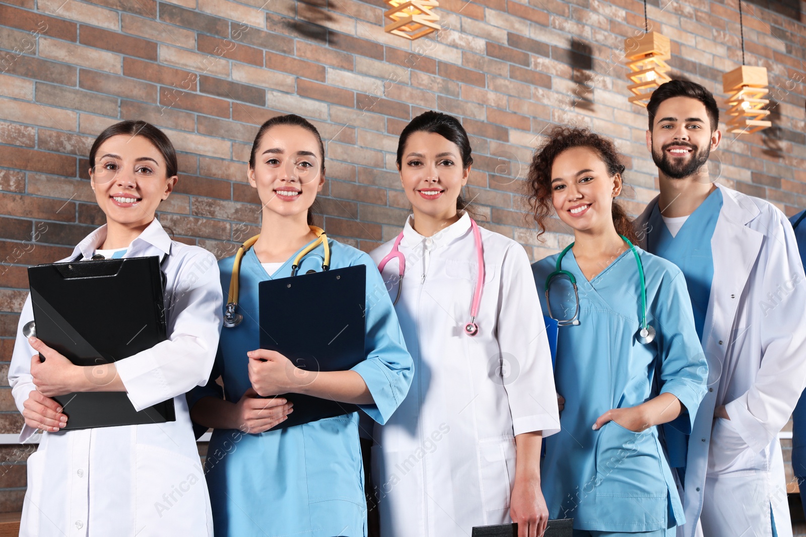 Photo of Team of medical workers in hospital. Unity concept