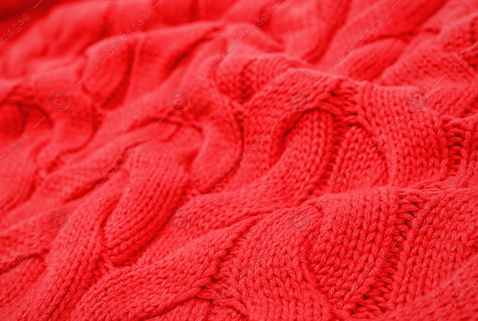 Photo of Texture of cozy warm sweater as background, closeup