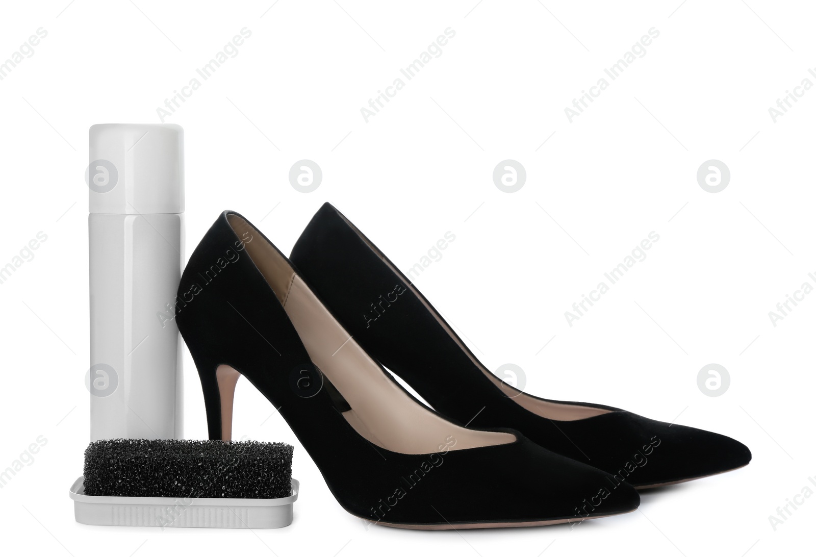 Photo of Stylish footwear and shoe care accessories on white background