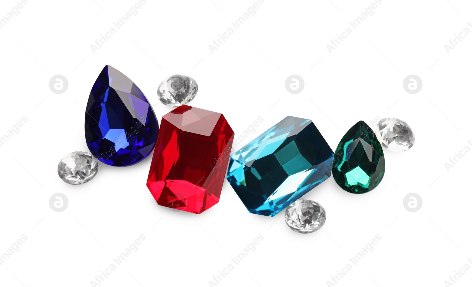 Photo of Different beautiful gemstones for jewelry isolated on white, top view