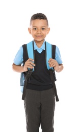 Photo of Portrait of cute African-American boy in school uniform with backpack on white background