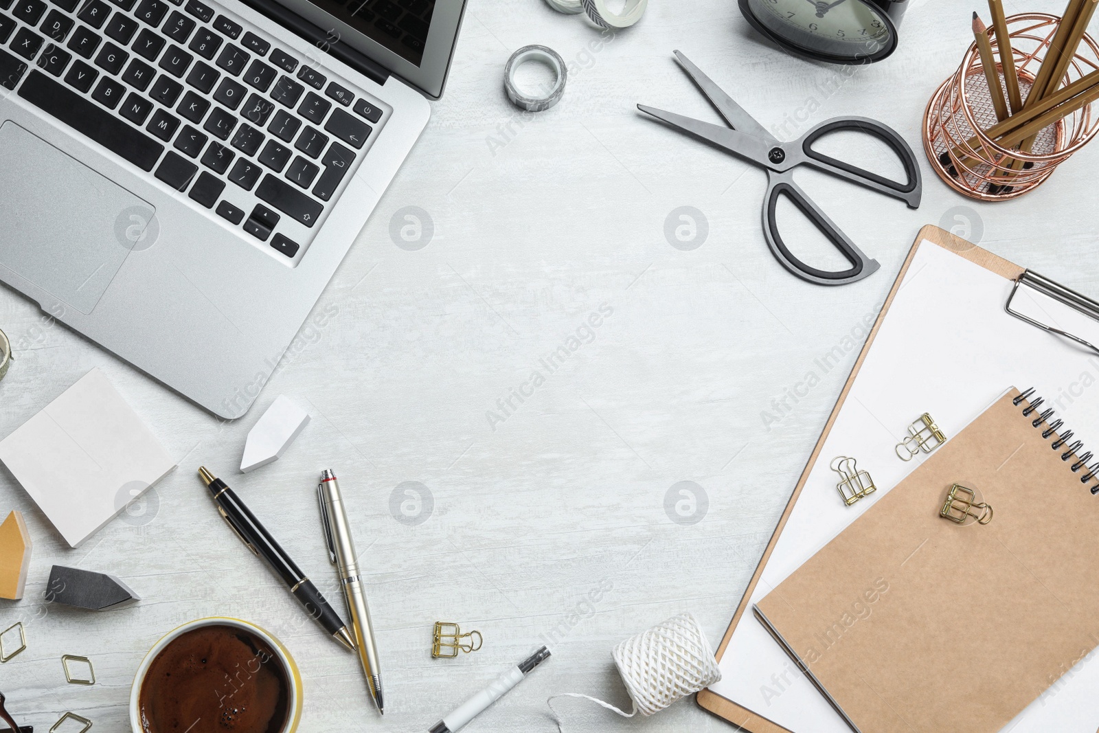 Photo of Flat lay composition with laptop and stationery on white table, space for text. Designer's workplace