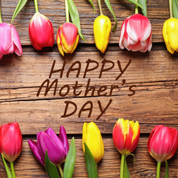 Image of Flat lay composition with beautiful tulips and phrase HAPPY MOTHER'S DAY on wooden background