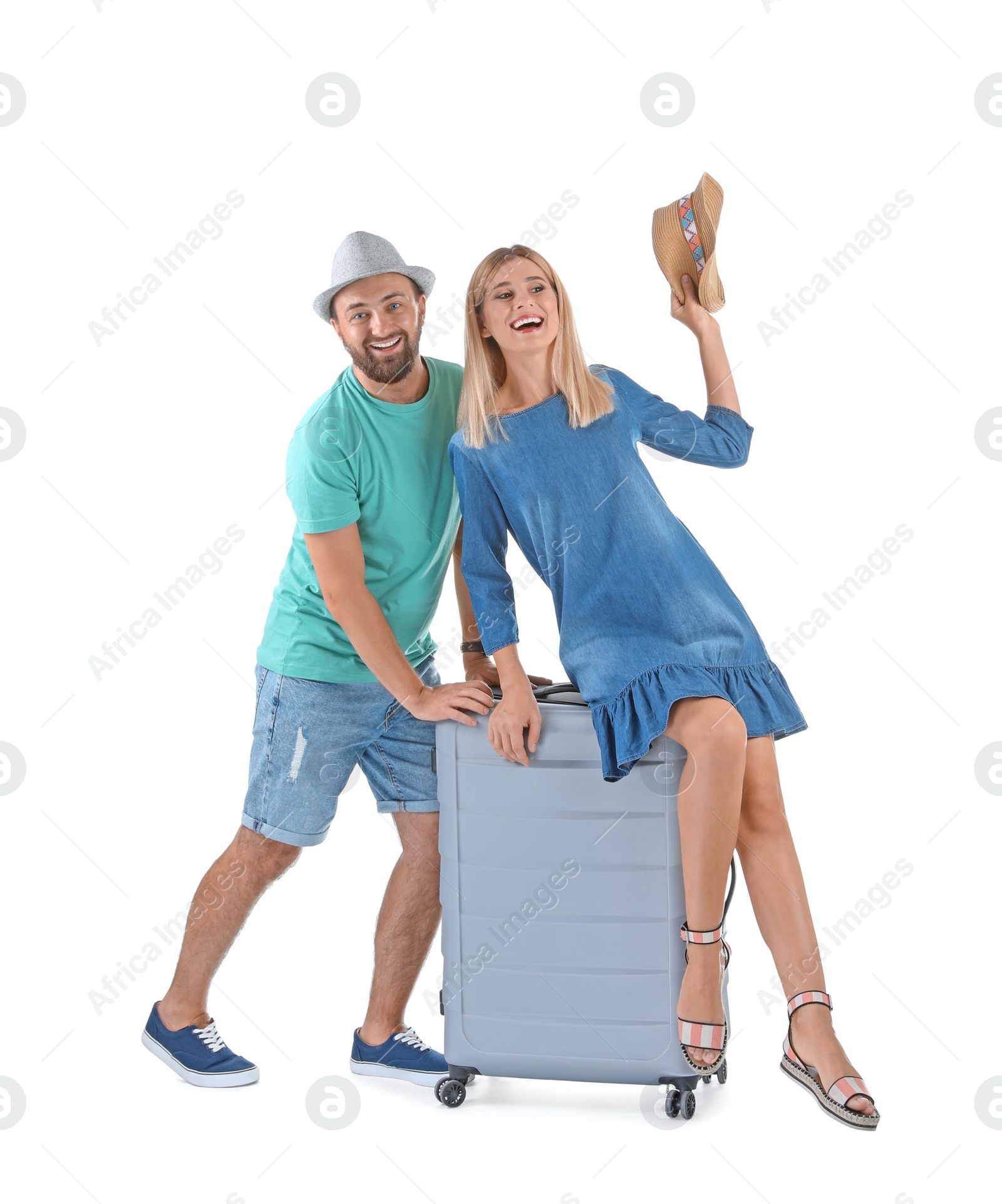 Photo of Couple with suitcase on white background. Vacation travel