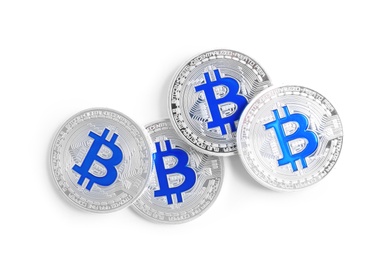 Photo of Bitcoins isolated on white, top view. Digital currency