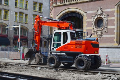 Road repair machine working on city street