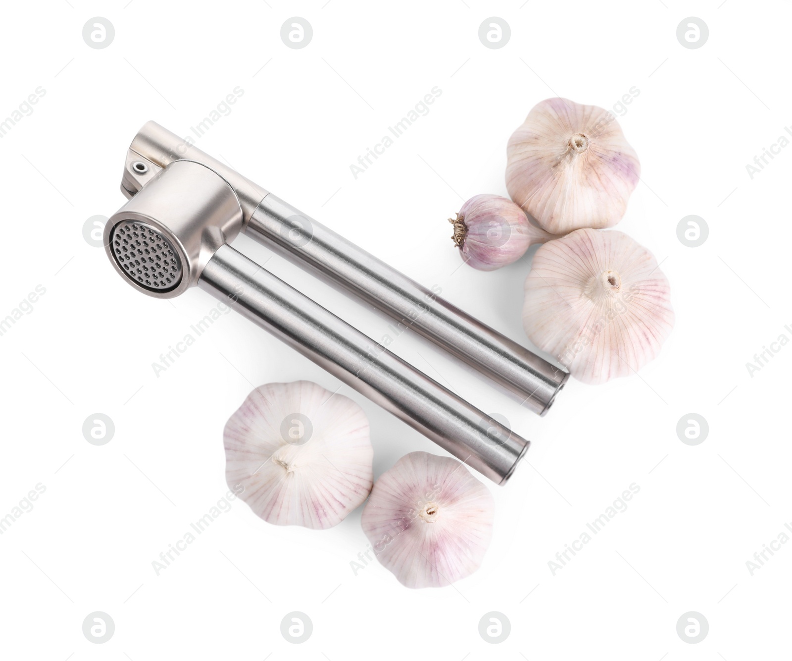 Photo of One metal press and garlic bulbs isolated on white, above view