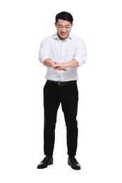 Businessman in formal clothes posing on white background