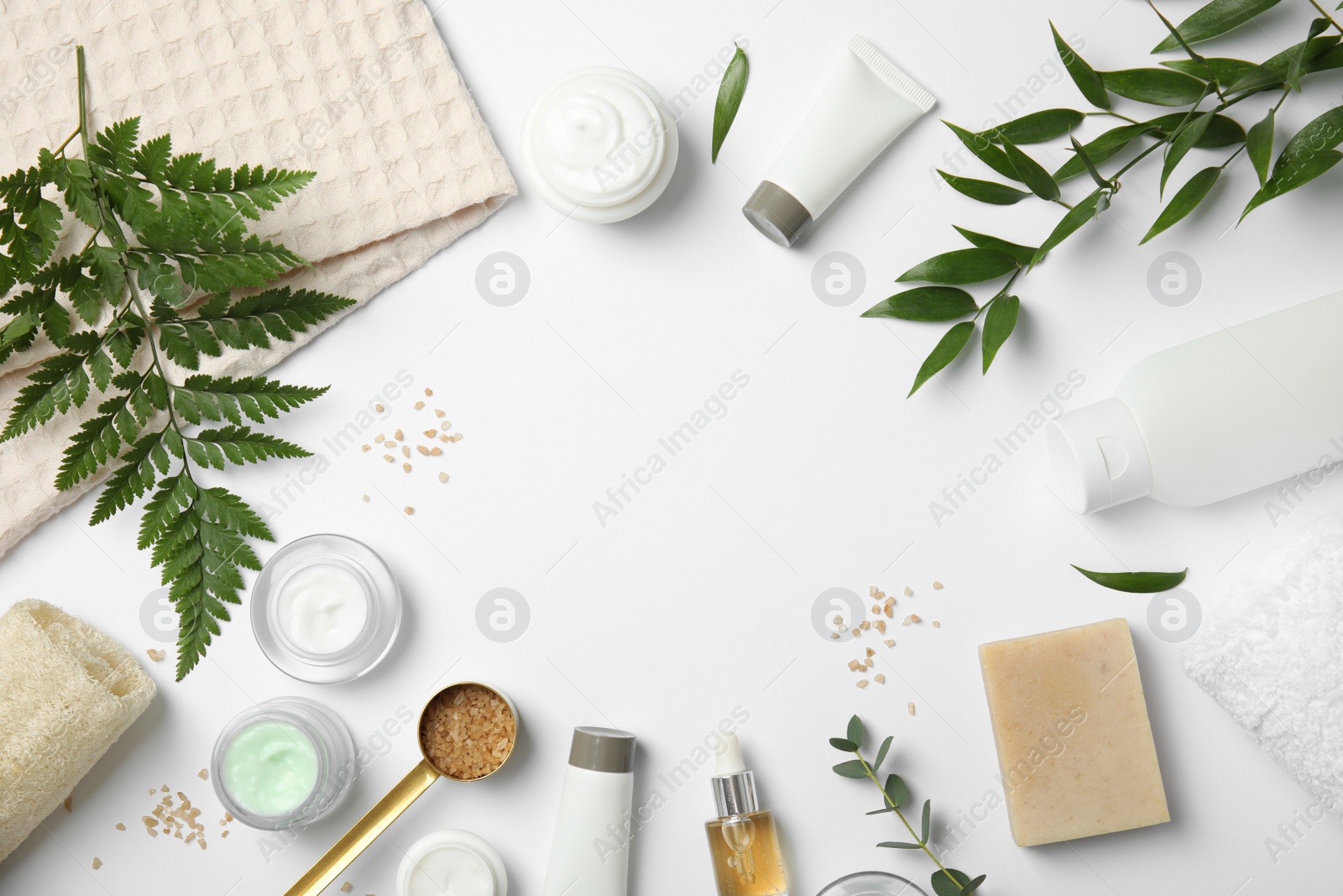 Photo of Flat lay composition with different body care products and space for text on white background