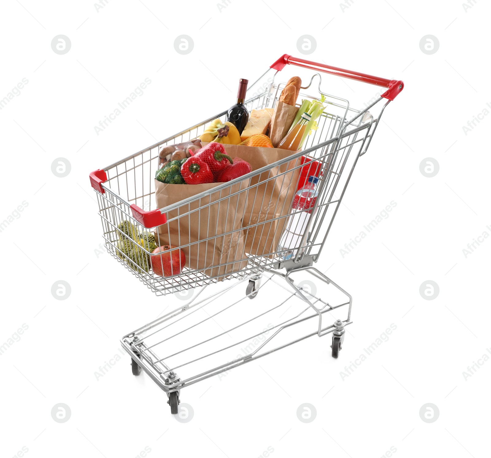 Photo of Shopping cart full of groceries on white background