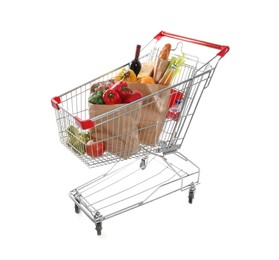 Photo of Shopping cart full of groceries on white background