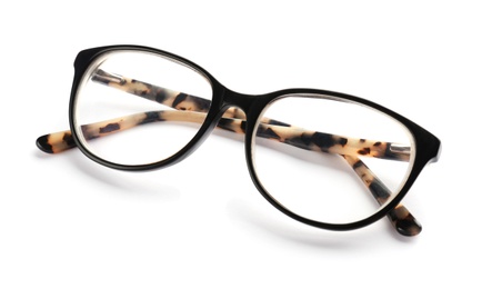 Photo of Glasses with corrective lenses on white background. Vision problem