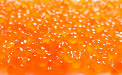 Photo of Delicious red caviar, closeup