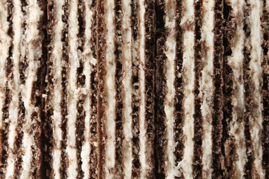 Photo of Closeup view of tasty wafer sticks as background. Sweet food