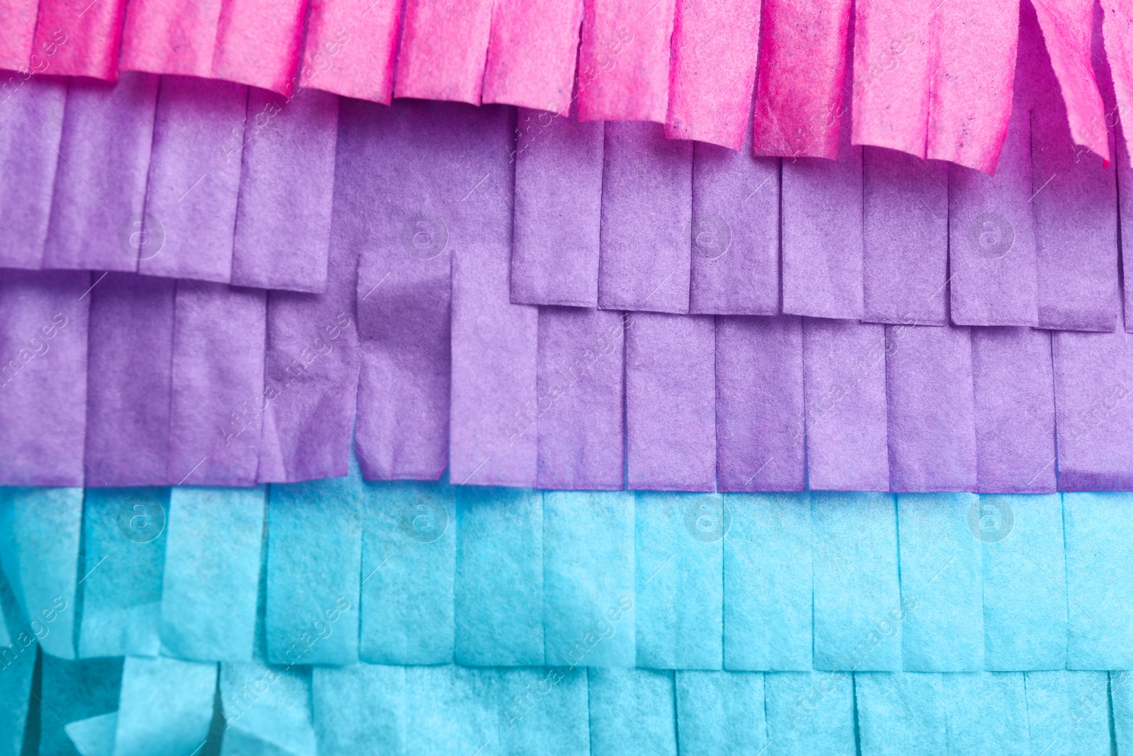 Photo of Cut tissue paper in different colors as background