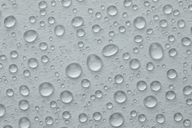 Photo of Water drops on white background, top view