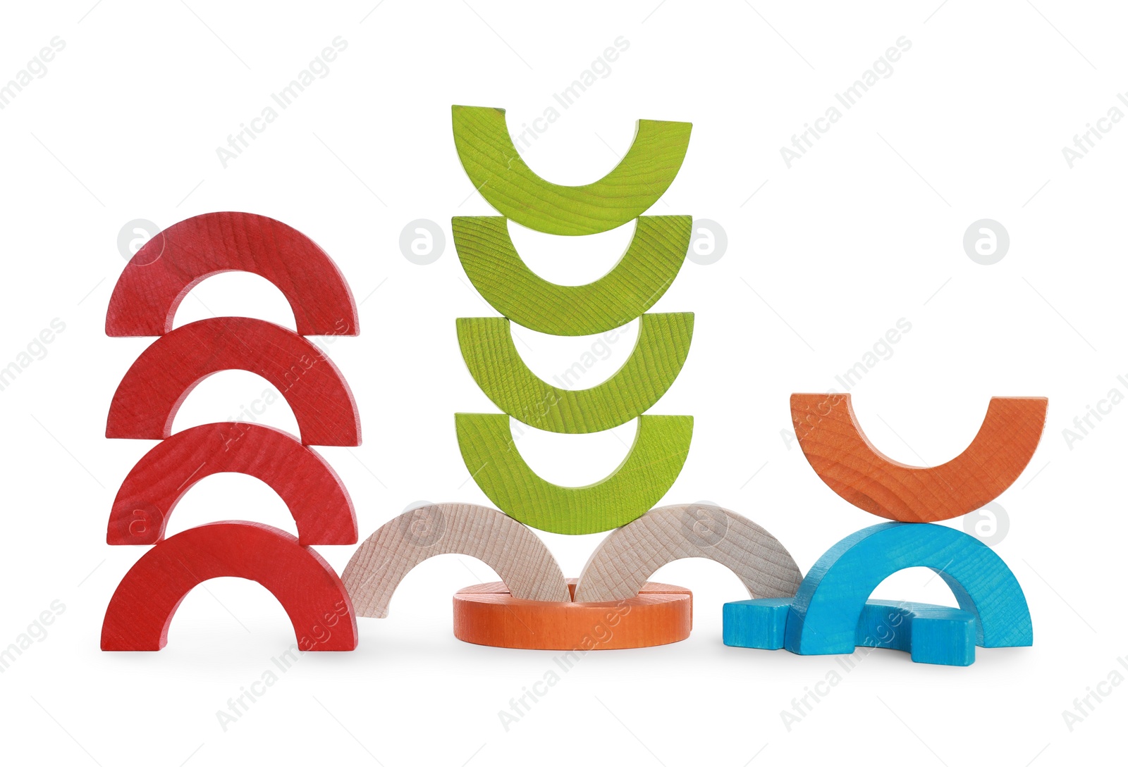 Photo of Colorful wooden pieces of play set isolated on white. Educational toy for motor skills development