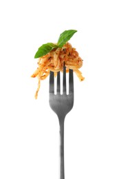 Fork with tasty pasta and basil isolated on white