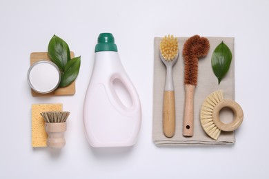 Photo of Flat lay composition with different cleaning supplies on white background