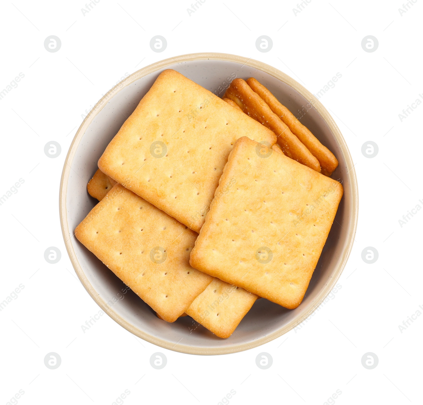 Photo of Tasty crackers in bowl isolated on white, top view