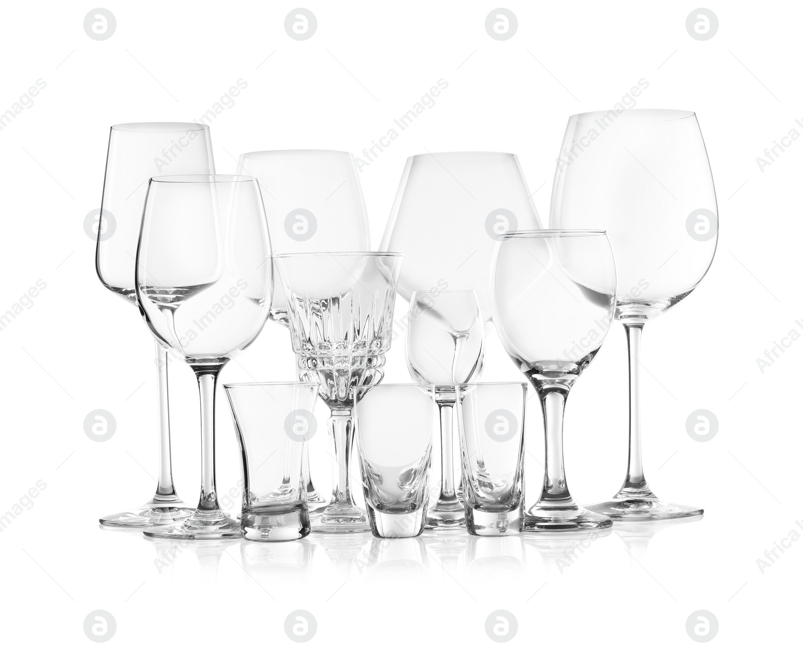 Photo of Set of new bar glassware on white background