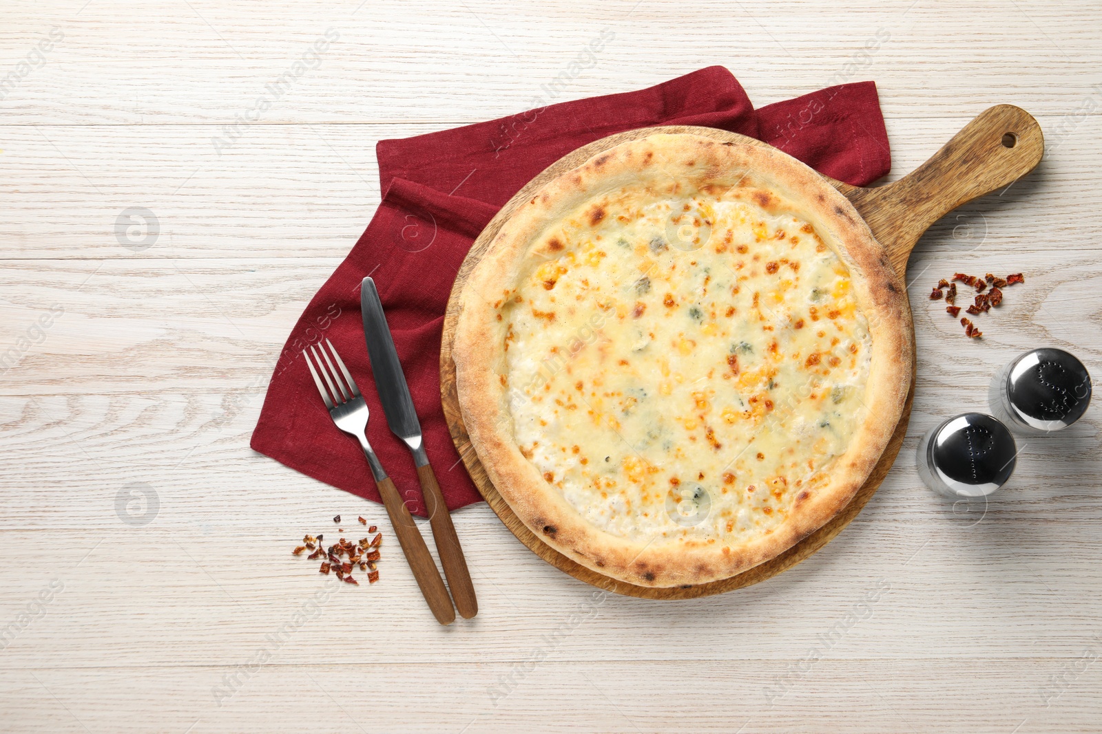 Photo of Delicious cheese pizza served on white wooden table, flat lay. Space for text