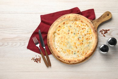 Photo of Delicious cheese pizza served on white wooden table, flat lay. Space for text